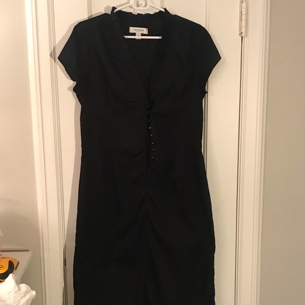 Pretty black dress with ruffle and buttons.